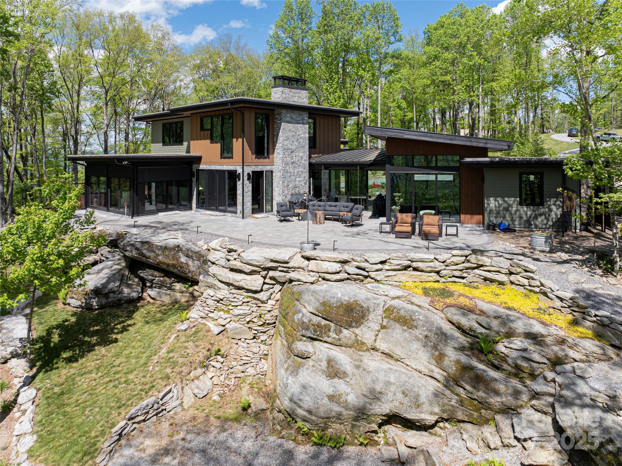 94 Laurel Ledge Way Fletcher, NC 28732 - Photo 45 of 48 a view of a house with swimming pool and sitting area