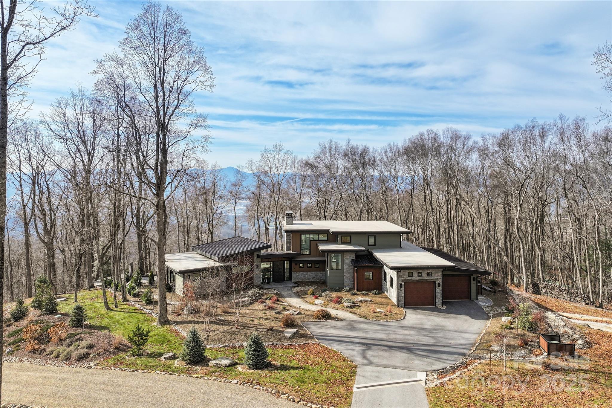 94 Laurel Ledge Way Fletcher, NC 28732 - Photo 47 of 48 a view of a house with a yard covered in snow