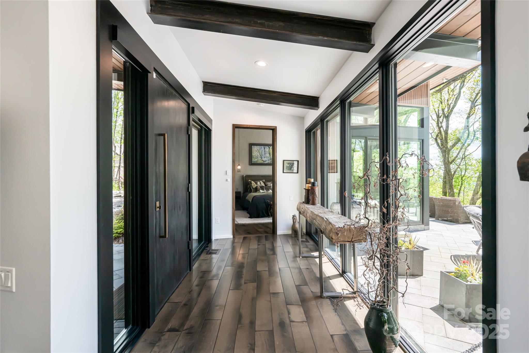 94 Laurel Ledge Way Fletcher, NC 28732 - Photo 5 of 48 a lobby with furniture and floor to ceiling windows