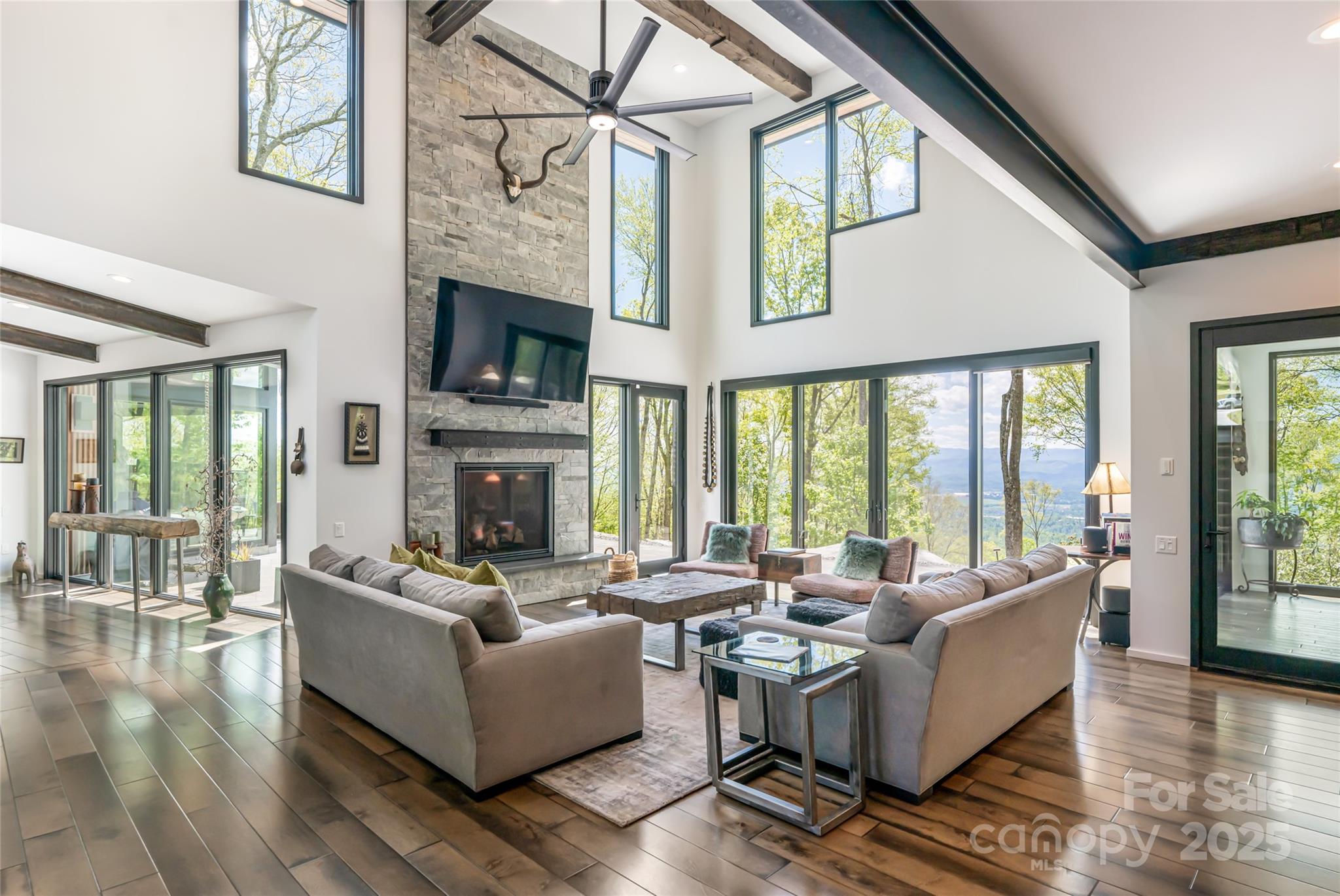 94 Laurel Ledge Way Fletcher, NC 28732 - Photo 7 of 48 a living room with fireplace furniture and a fireplace