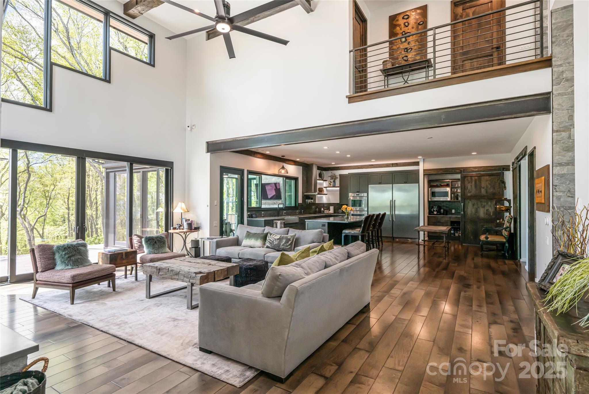 94 Laurel Ledge Way Fletcher, NC 28732 - Photo 8 of 48 a living room with furniture and a large window