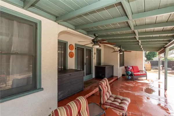an outdoor space with swimming pool having patio