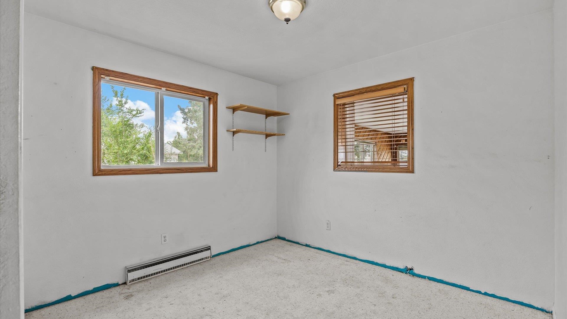 8460 Bobs Road Austin, CO 81410 - Photo 11 of 32 a view of an empty room with windows