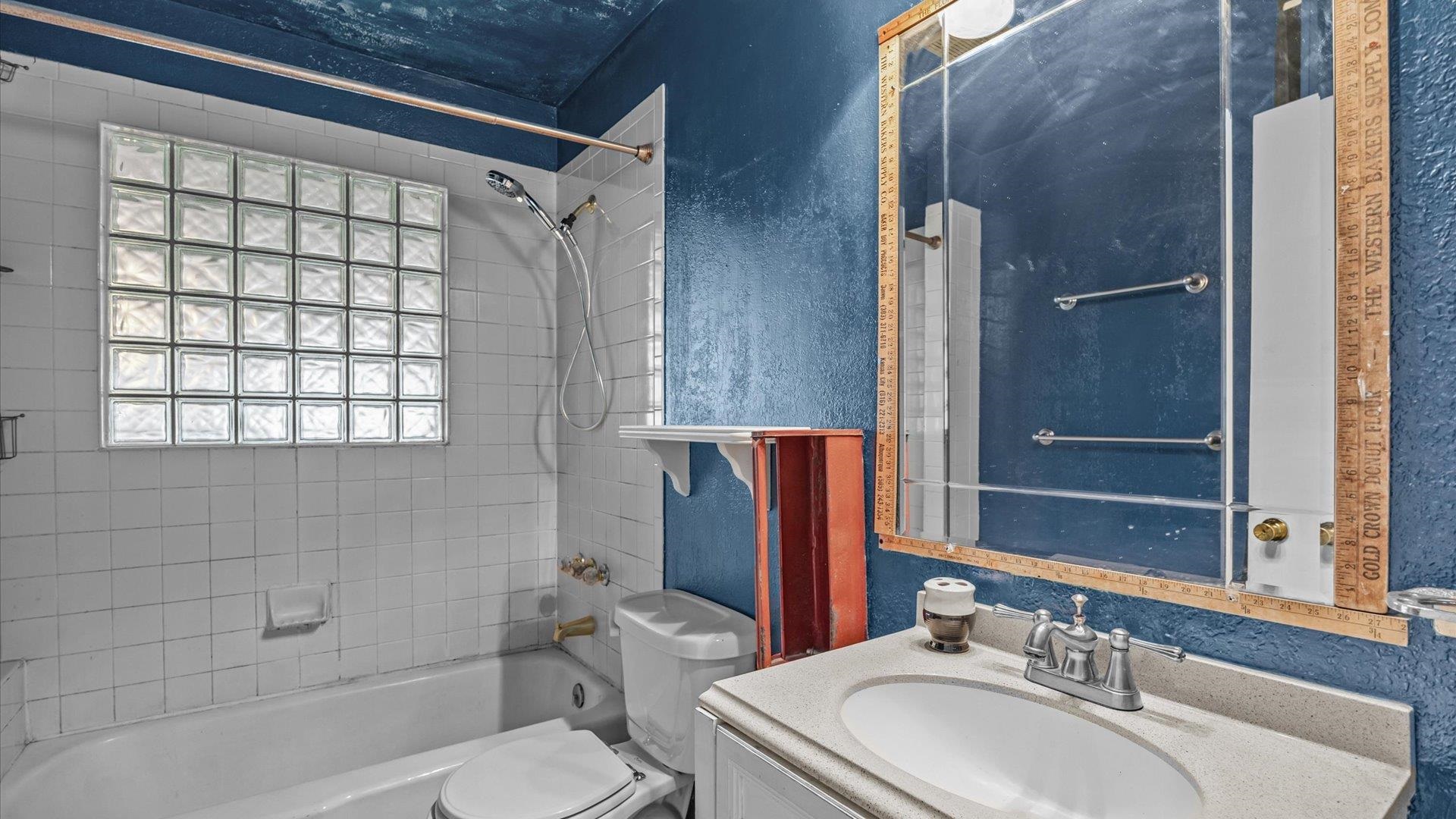 8460 Bobs Road Austin, CO 81410 - Photo 12 of 32 a bathroom with a sink toilet and shower