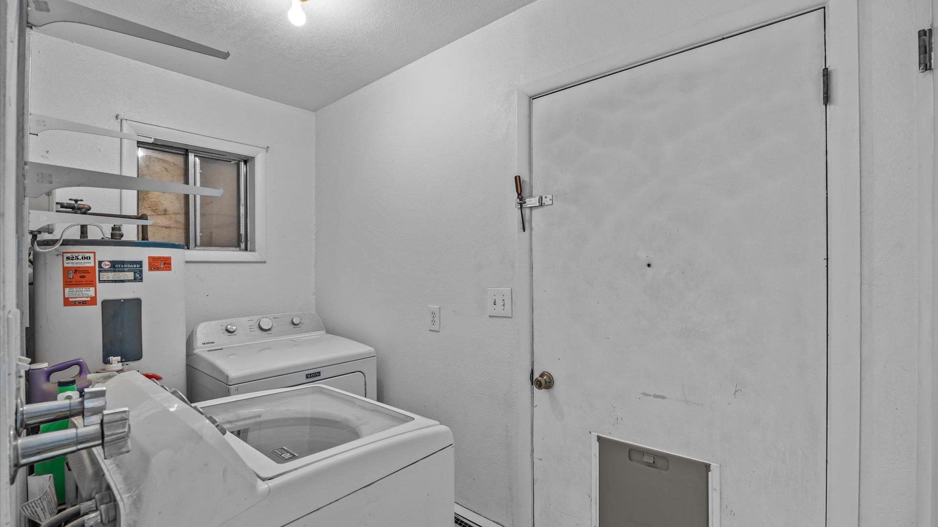 8460 Bobs Road Austin, CO 81410 - Photo 20 of 32 a utility room with dryer and washer