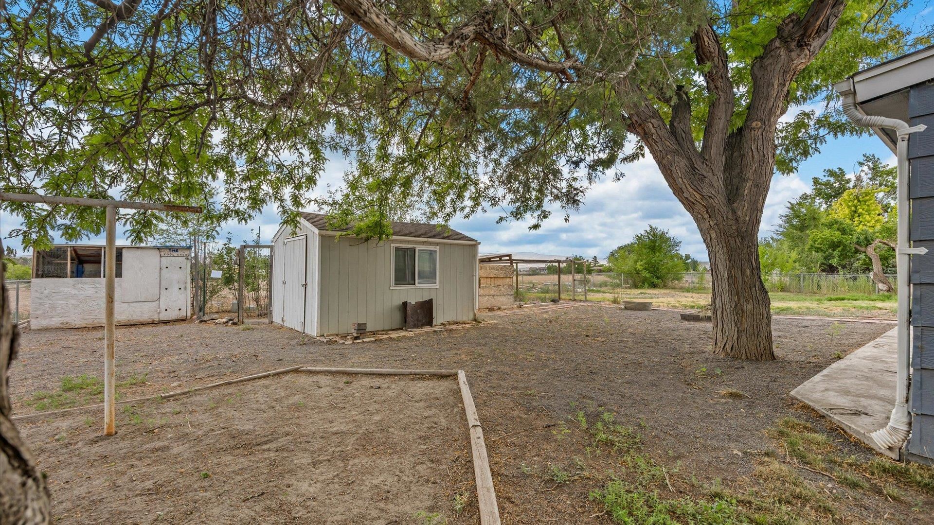 8460 Bobs Road Austin, CO 81410 - Photo 22 of 32 a view of a house with a tree in front of it
