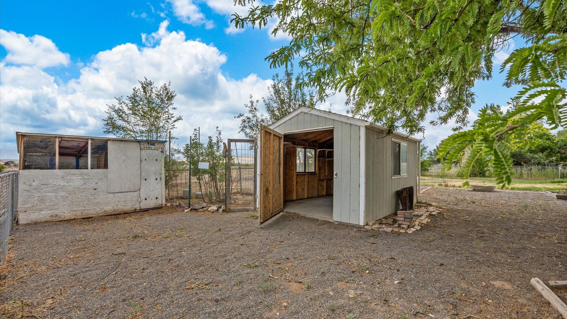 8460 Bobs Road Austin, CO 81410 - Photo 23 of 32 a view of a house with a tree and big yard