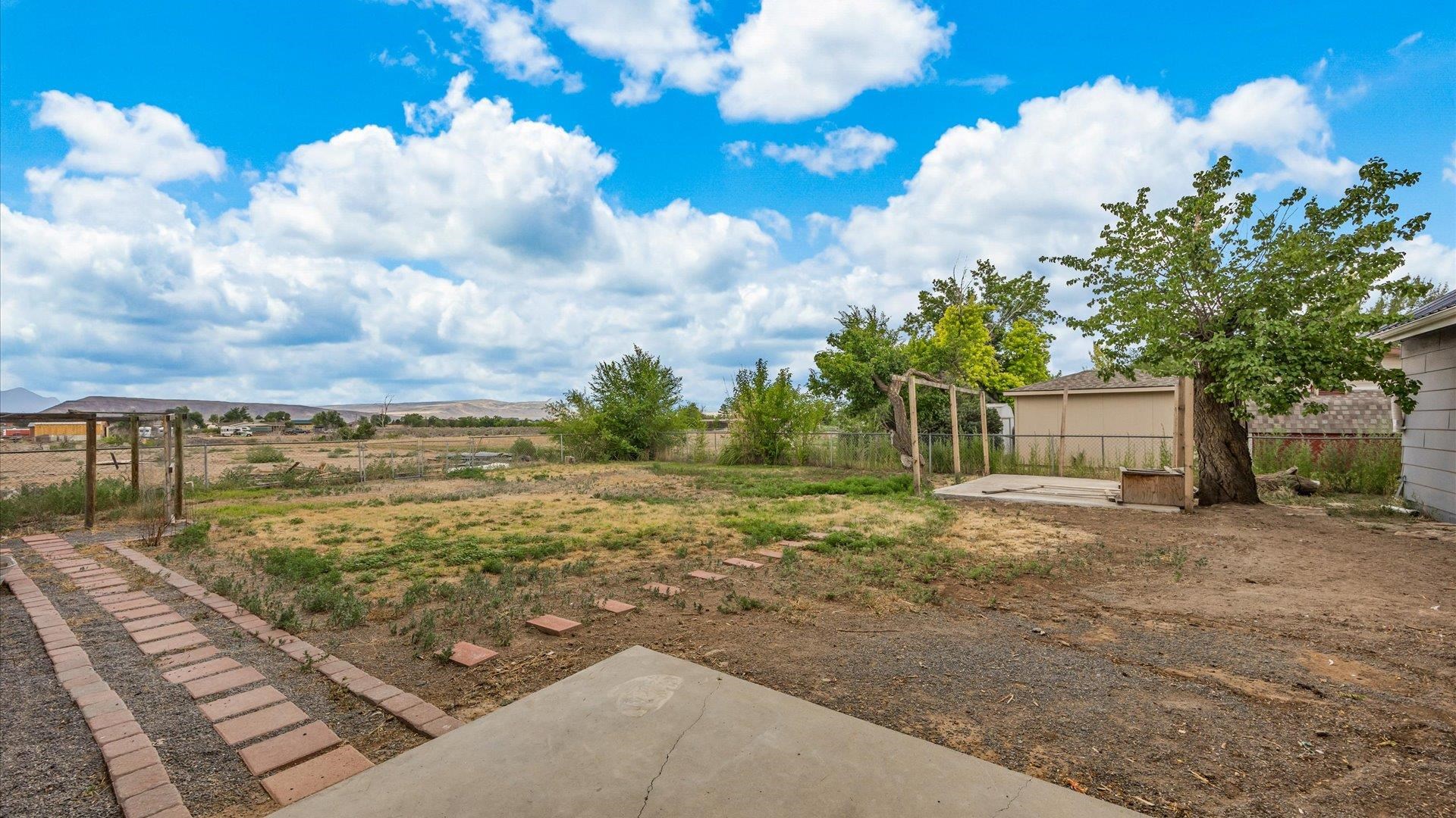 8460 Bobs Road Austin, CO 81410 - Photo 25 of 32 a view of a house with a yard