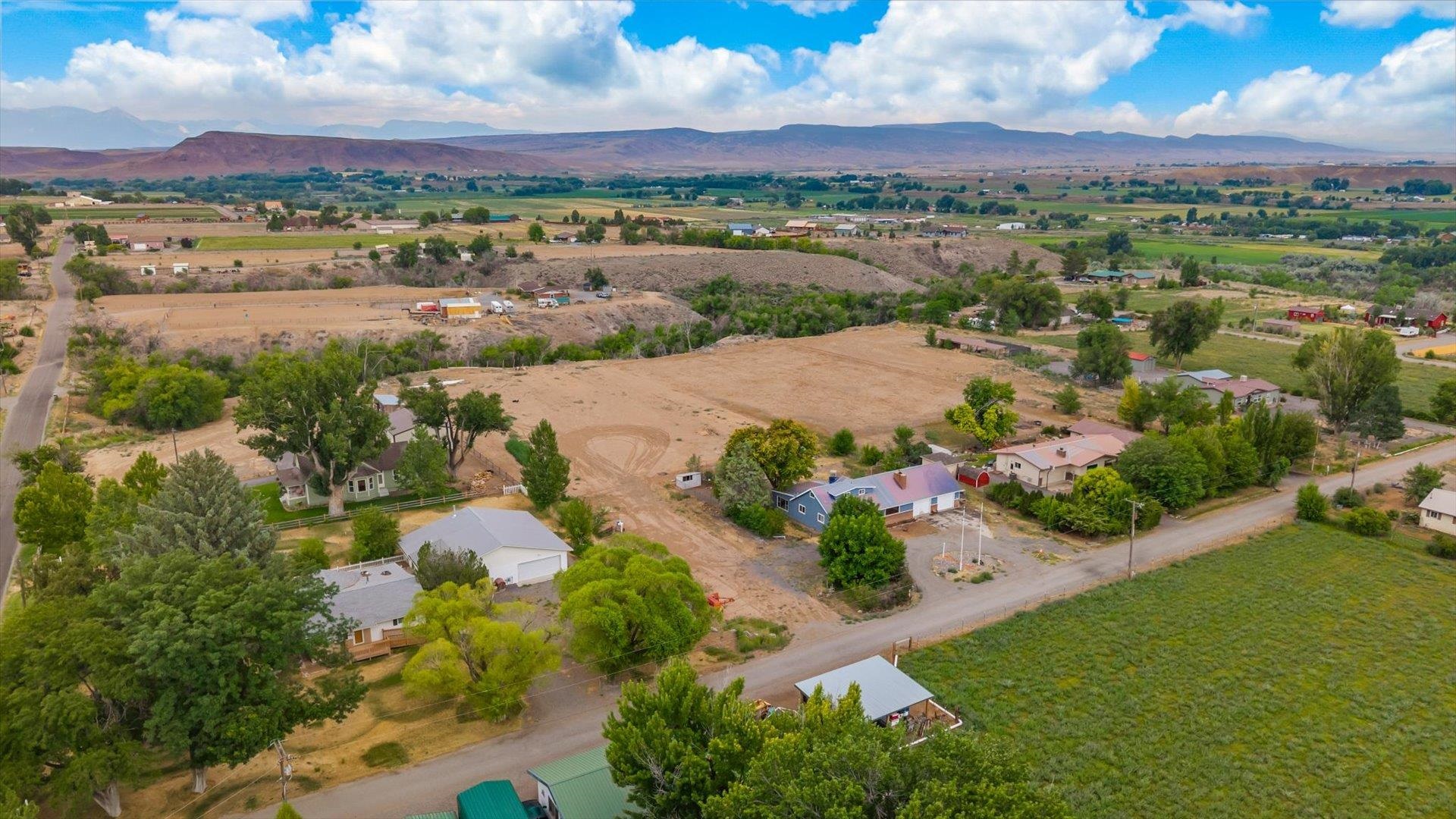 8460 Bobs Road Austin, CO 81410 - Photo 30 of 32 an aerial view of lake residential houses with outdoor space and trees
