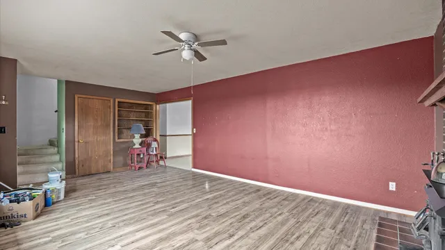 a view of a livingroom with hardwood floor