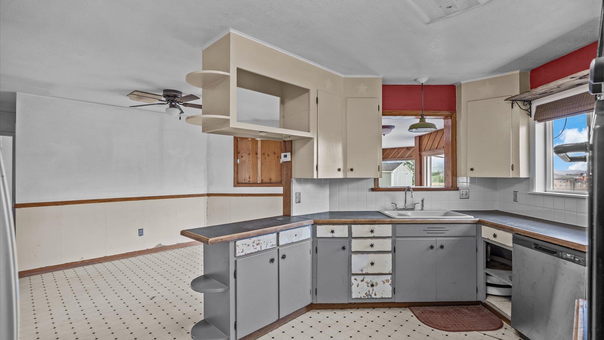 8460 Bobs Road Austin, CO 81410 - Photo 6 of 32 a kitchen with a sink cabinets and window