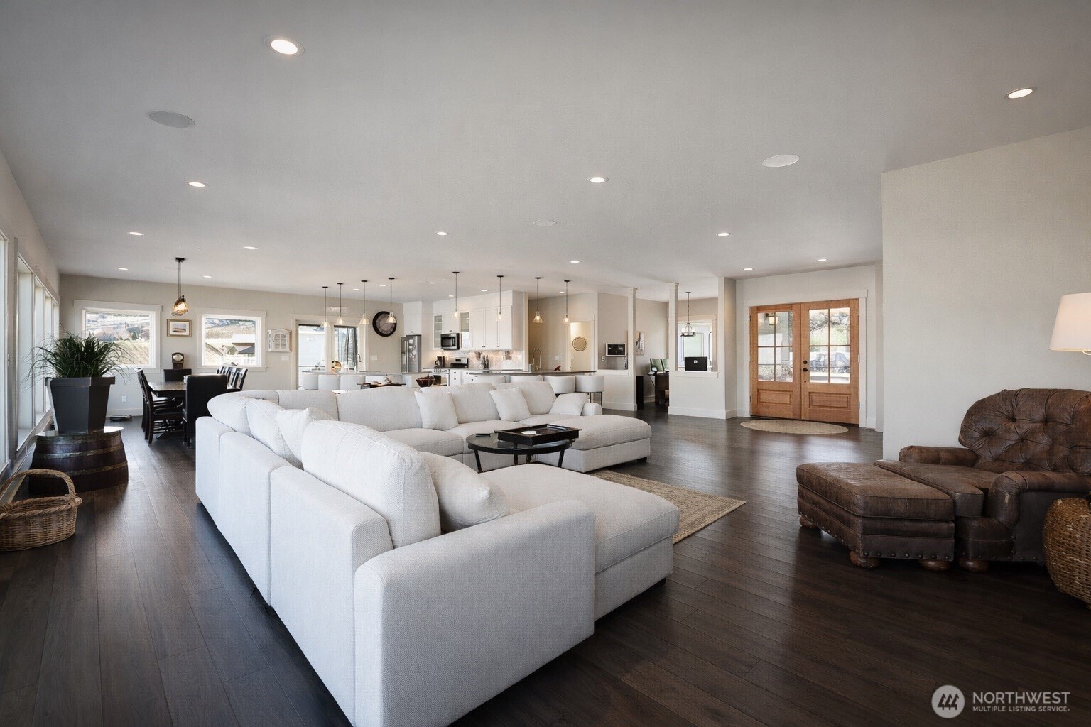 149 Clos Chevalle Road Chelan, WA 98816 - Photo 7 of 37 a living room with furniture and wooden floor