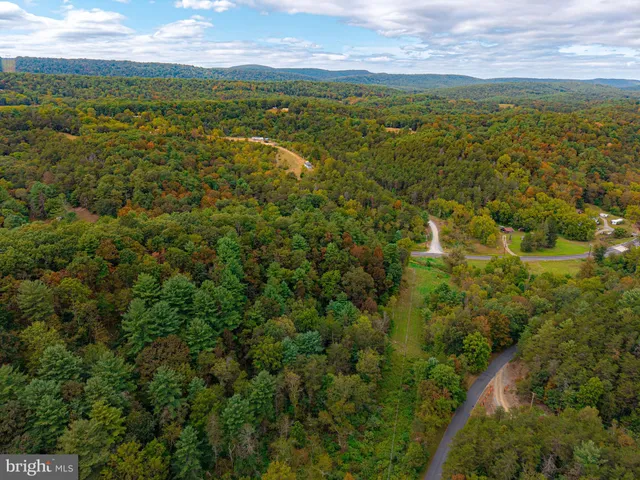 a view of an ocean and mountain