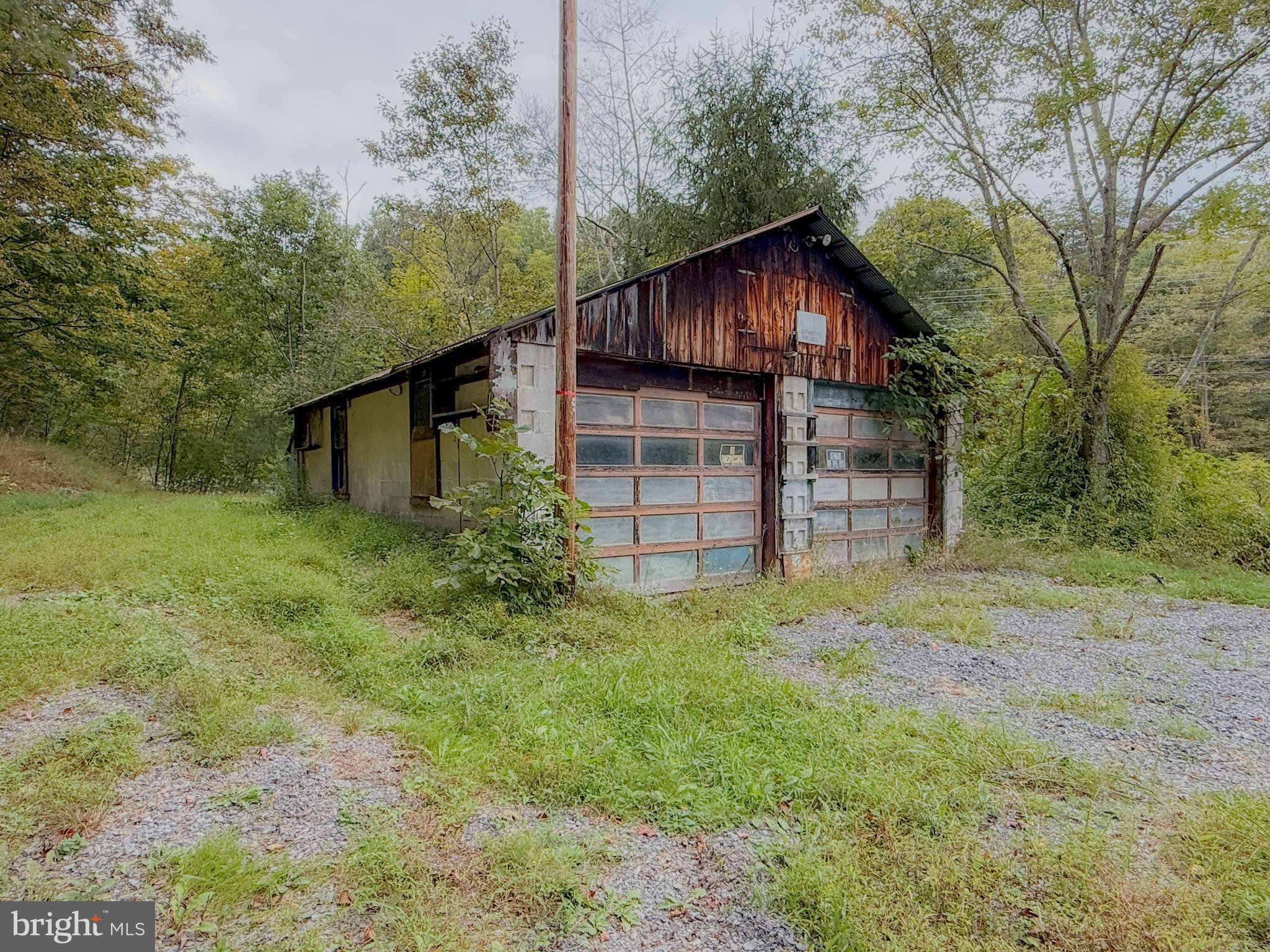 22015 Waterfall Road Three Springs, PA 17264 - Photo 21 of 23 a backyard of a house with lots of green space
