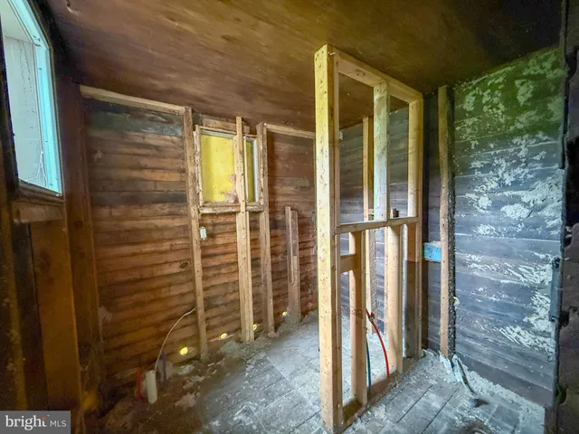 a view of a bathroom with a glass door