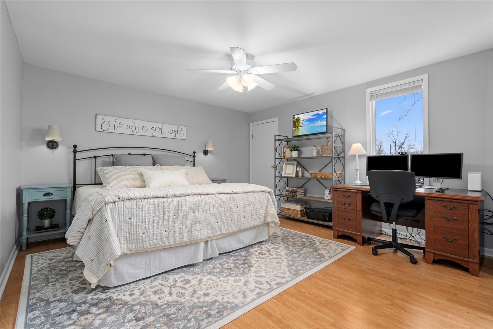 4516 Drendel Road Downers Grove, IL 60515 - Photo 13 of 29 a bedroom with a large bed and a desk