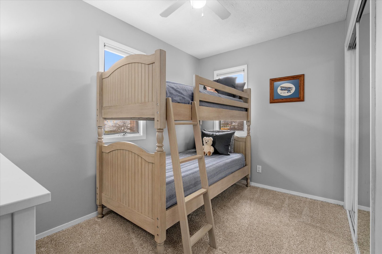 4516 Drendel Road Downers Grove, IL 60515 - Photo 17 of 29 a bedroom with a bed and a mirror