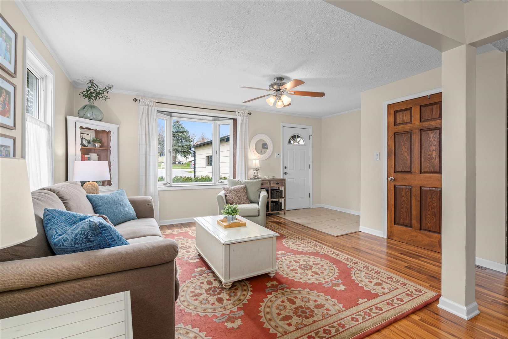 4516 Drendel Road Downers Grove, IL 60515 - Photo 3 of 29 a living room with furniture rug and window