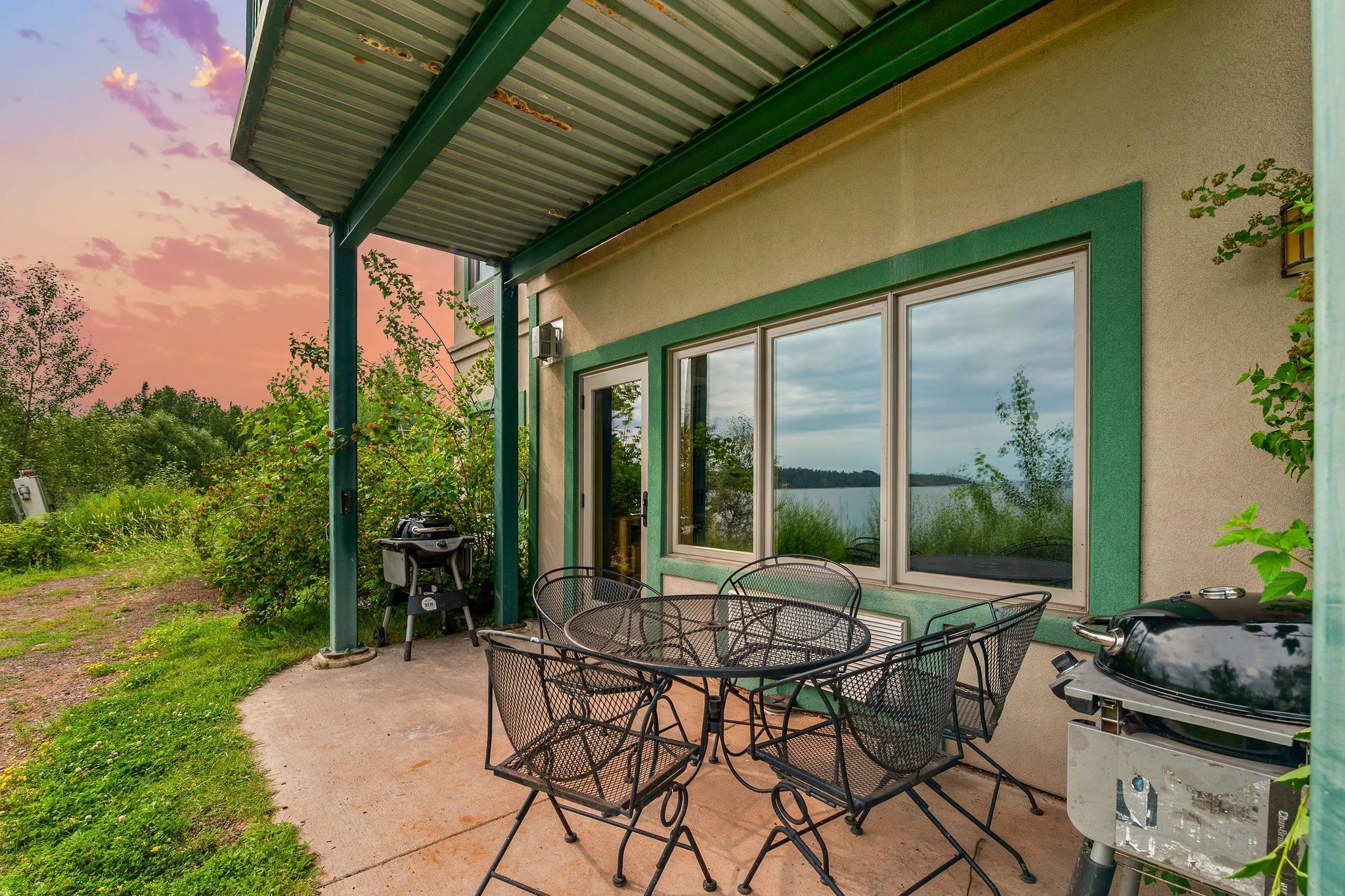 Two Burlington Road, Unit 5102 Two Harbors, MN 55616 - Photo 19 of 30 View of patio with area for grilling and outdoor dining area