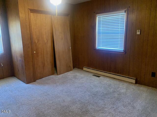 1527 Hardee Road Fuquay-Varina, NC 27526 - Photo 7 of 9 a view of an empty room with a window