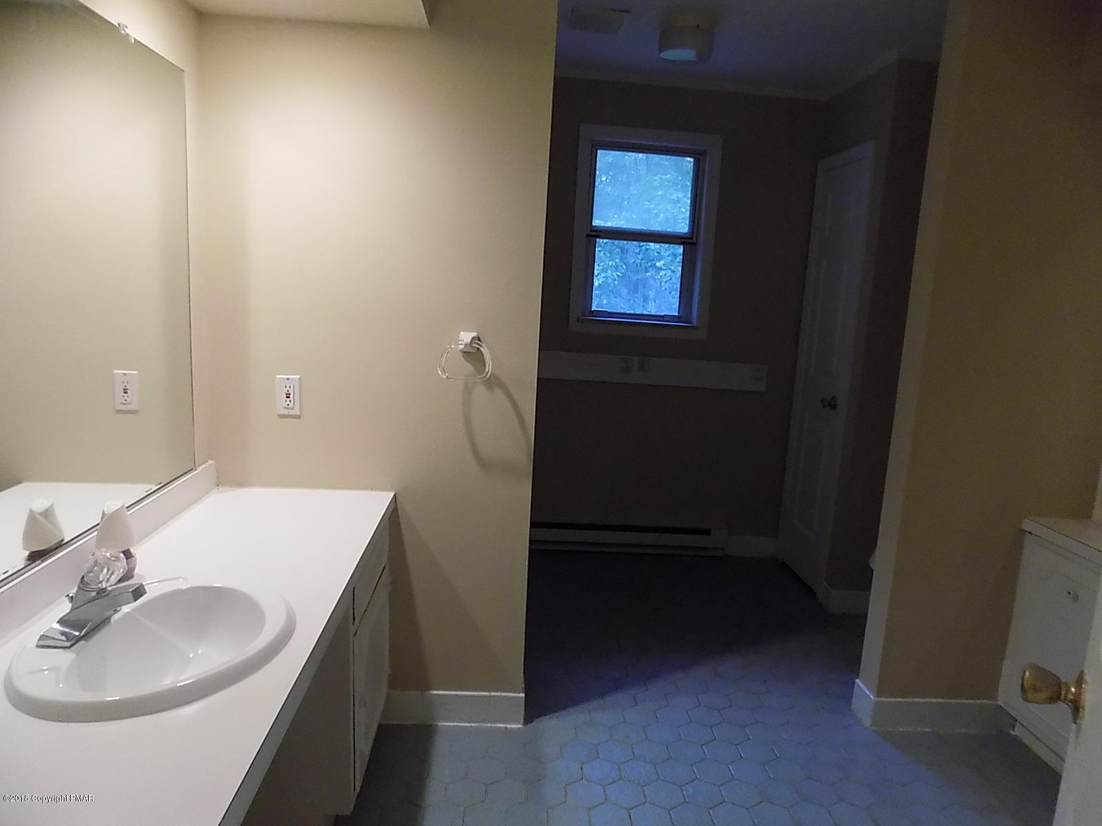 1151 Browning Road East Stroudsburg, PA 18301 - Photo 12 of 19 a bathroom with a sink and a mirror