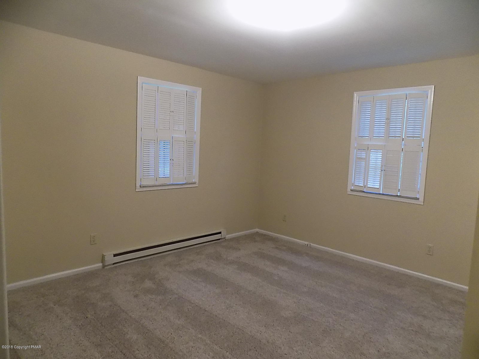 1151 Browning Road East Stroudsburg, PA 18301 - Photo 16 of 19 an empty room with windows