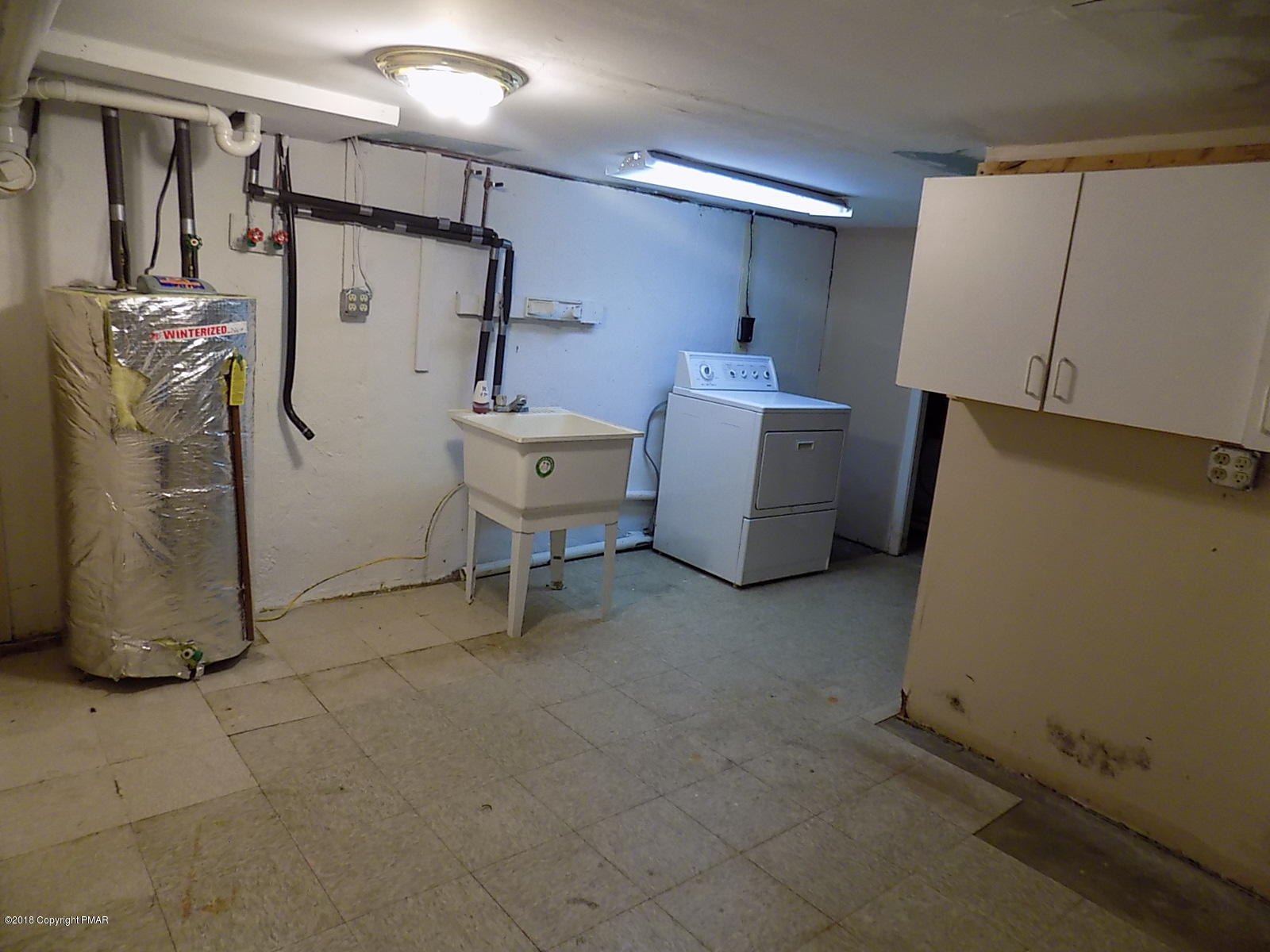1151 Browning Road East Stroudsburg, PA 18301 - Photo 18 of 19 a room with refrigerator and washer