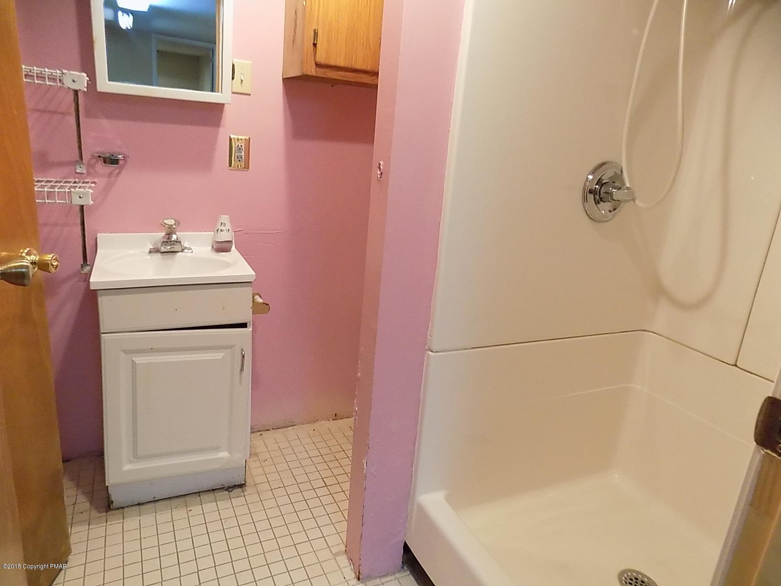 1151 Browning Road East Stroudsburg, PA 18301 - Photo 19 of 19 a bathroom with a sink a toilet and shower