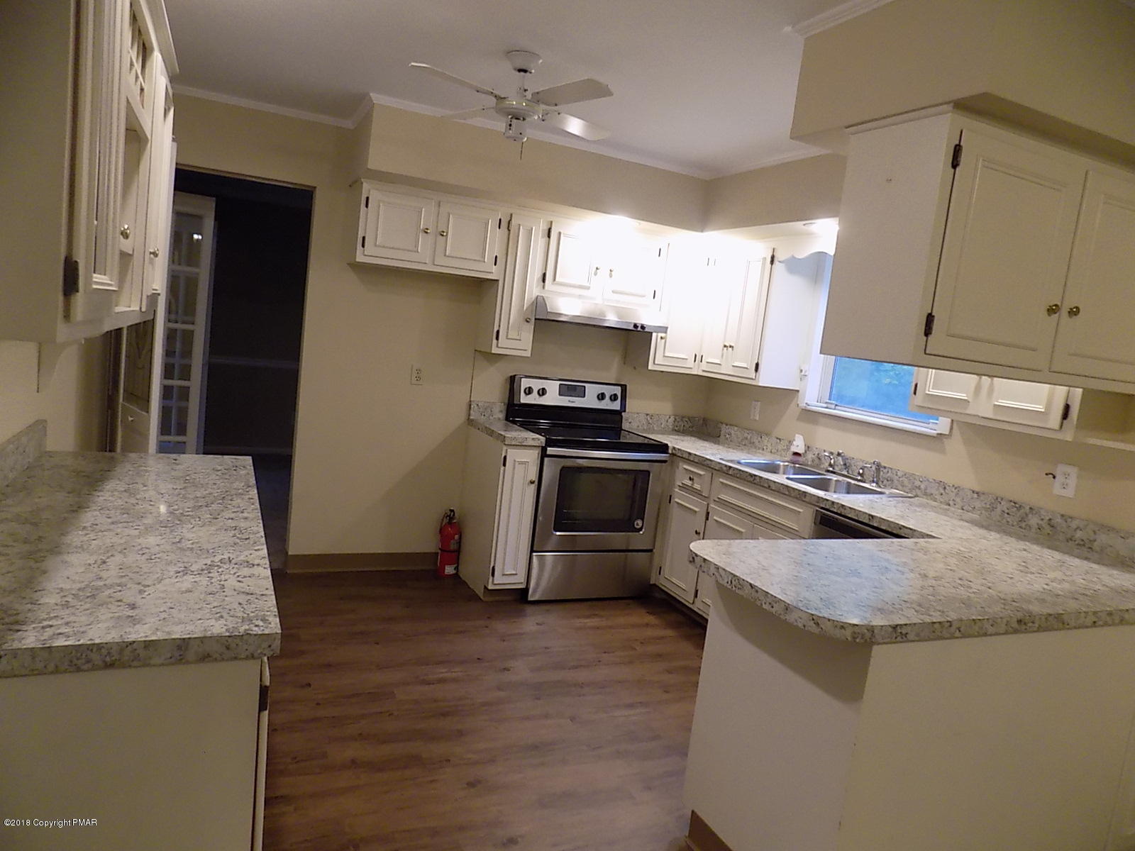 1151 Browning Road East Stroudsburg, PA 18301 - Photo 8 of 19 a kitchen with granite countertop a sink and stainless steel appliances