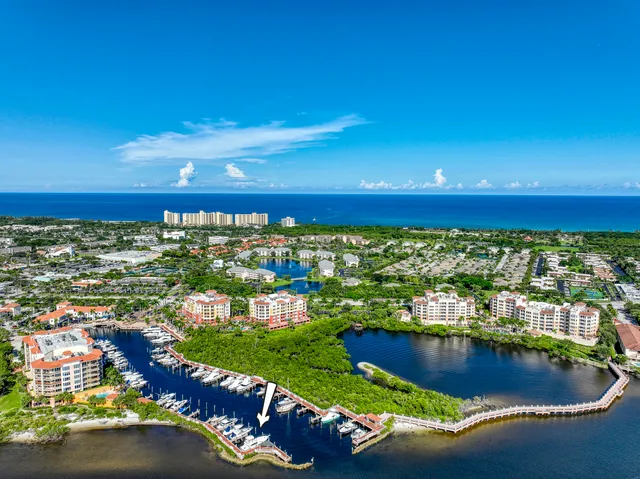 a view of a swimming pool with an ocean view