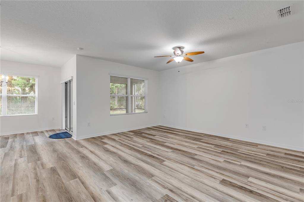 353 Admiralty Court Edgewater, FL 32141 - Photo 13 of 56 a view of an empty room with a window