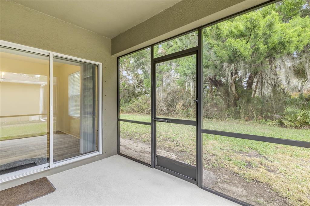 353 Admiralty Court Edgewater, FL 32141 - Photo 38 of 56 a view of a room with yard from balcony