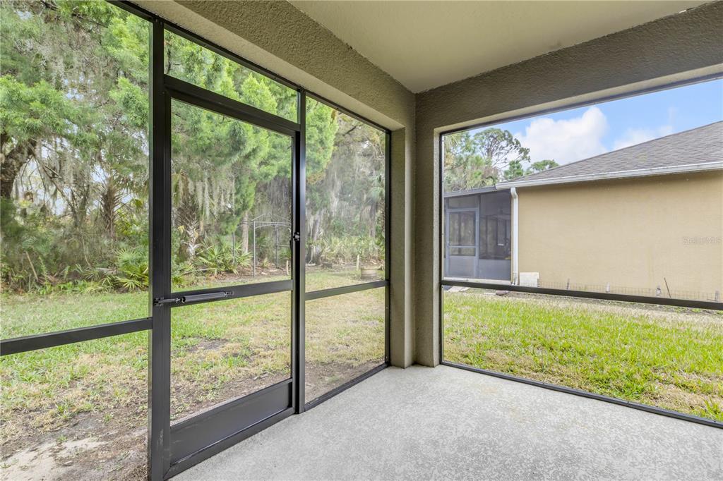 353 Admiralty Court Edgewater, FL 32141 - Photo 39 of 56 a view of an empty room with a large window