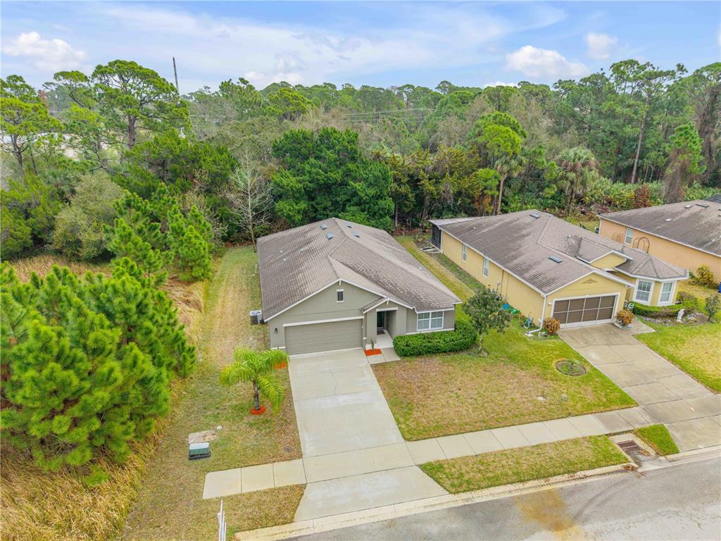 353 Admiralty Court Edgewater, FL 32141 - Photo 43 of 56 an aerial view of a house