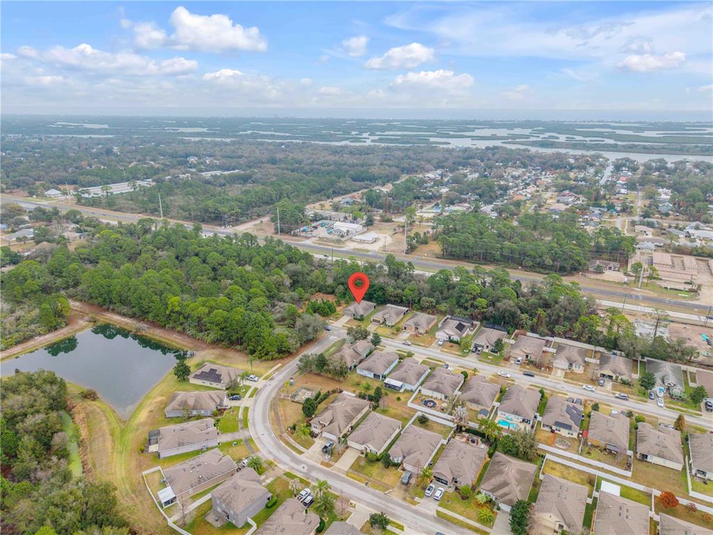 353 Admiralty Court Edgewater, FL 32141 - Photo 49 of 56 an aerial view of residential houses with outdoor space