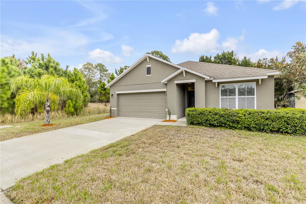 353 Admiralty Court Edgewater, FL 32141 - Photo 55 of 56 front view of a house with a yard