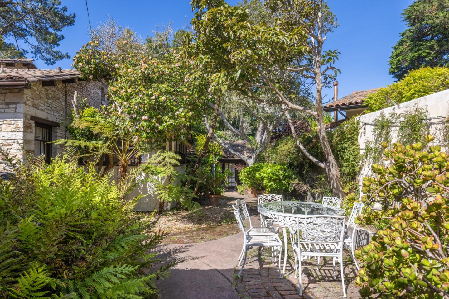 25286 Hatton Road Carmel, CA 93923 - Photo 6 of 34 a view of an outdoor space with a table and chairs