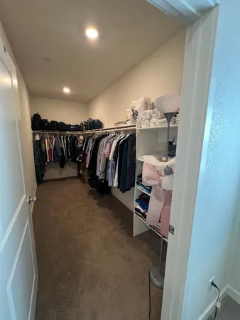 a bed room with a bed and furniture