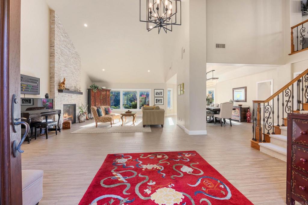 13348 Old Winery Road Poway, CA 92064 - Photo 14 of 68 a living room with furniture and a chandelier