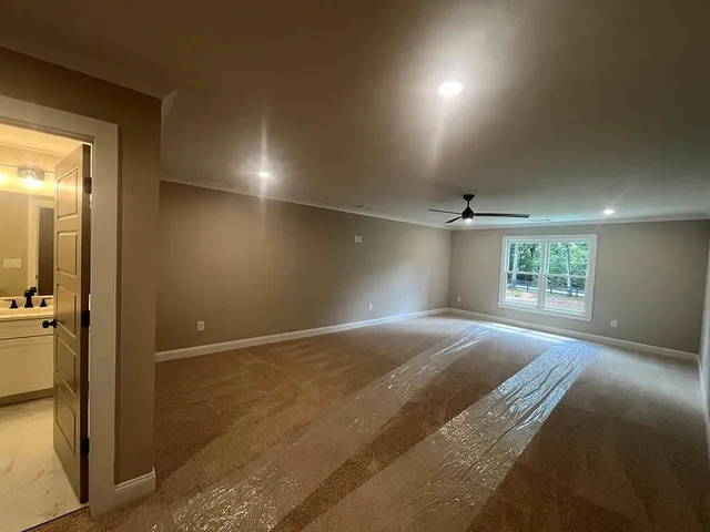 a front view of a house with a sitting area