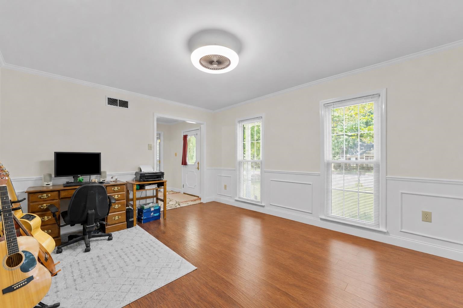 2218 Riverdale Road Germantown, TN 38138 - Photo 13 of 40 Bright dining room with large windows, abundant natural light, and a versatile layout that can easily accommodate formal dining or a stylish home office.