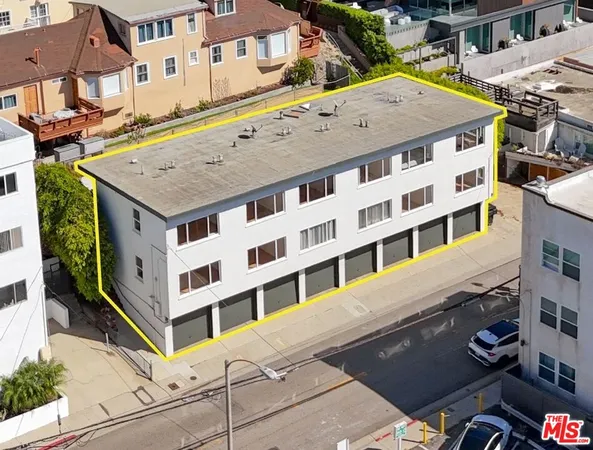 a view of a building with a street
