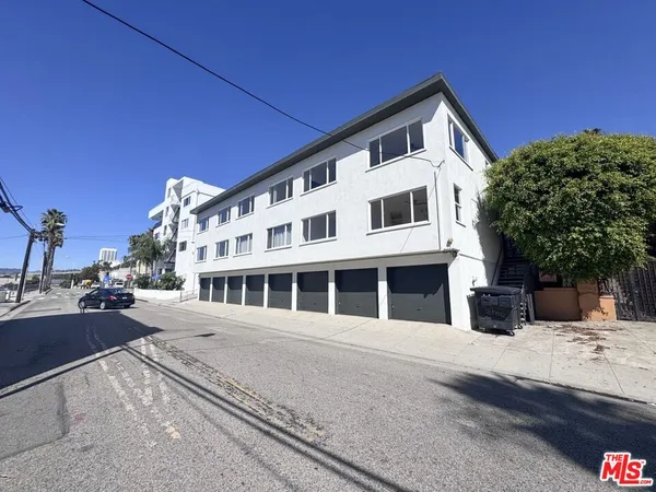 a view of a building with a street