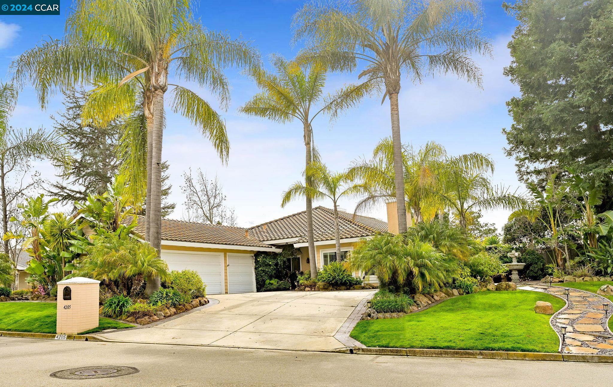 4205 Canyon Crest Road West San Ramon, CA 94582 - Photo 1 of 1 a front view of a house with garden