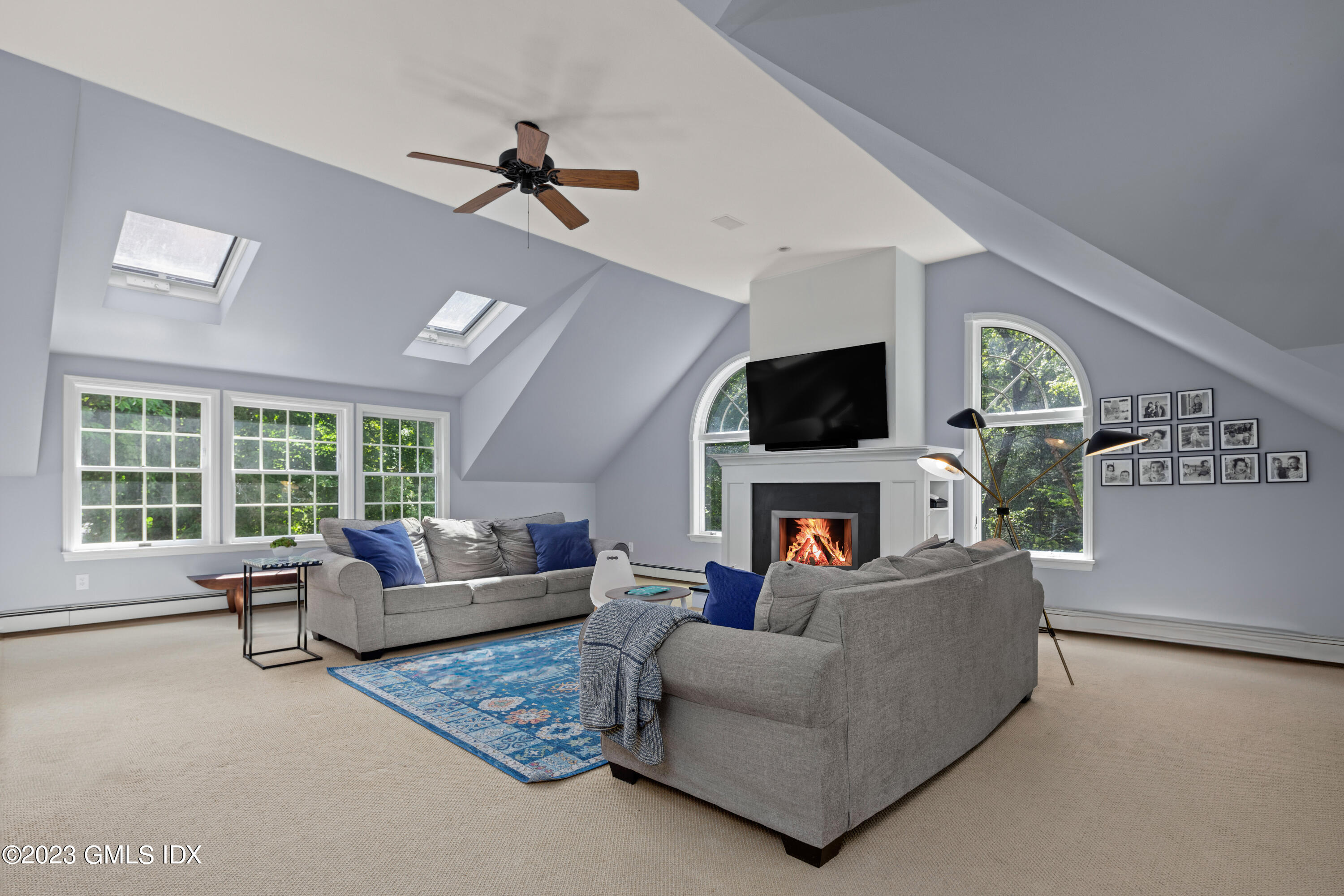 29 Indian Mill Road Cos Cob, CT 06807 - Photo 26 of 44 a living room with furniture and a flat screen tv