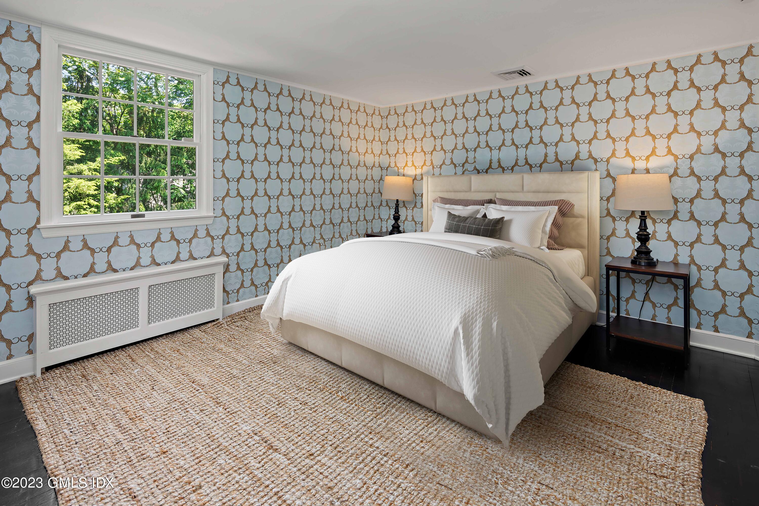 29 Indian Mill Road Cos Cob, CT 06807 - Photo 31 of 44 a bedroom with a bed and a window