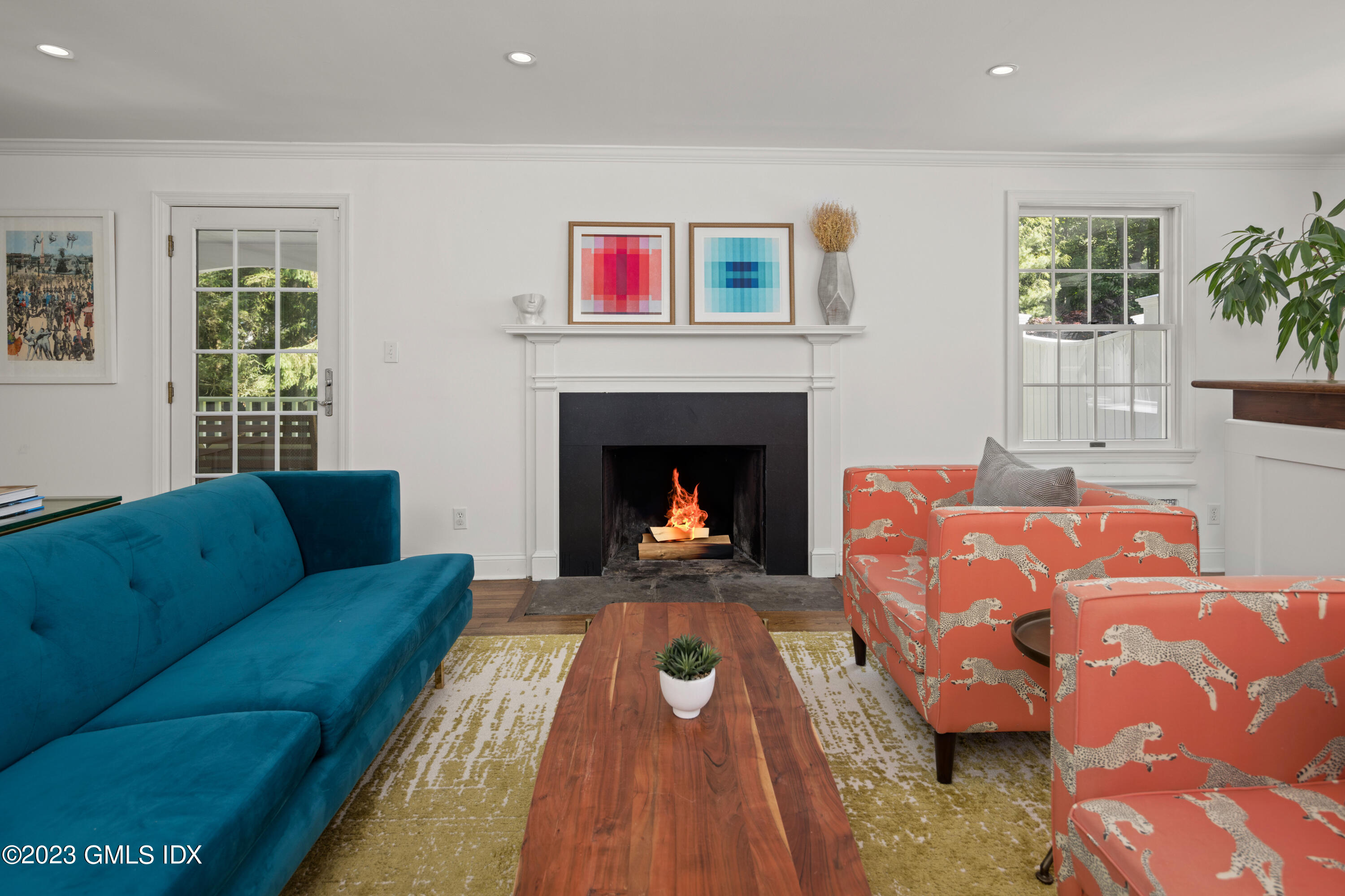 29 Indian Mill Road Cos Cob, CT 06807 - Photo 9 of 44 a living room with furniture and a fireplace