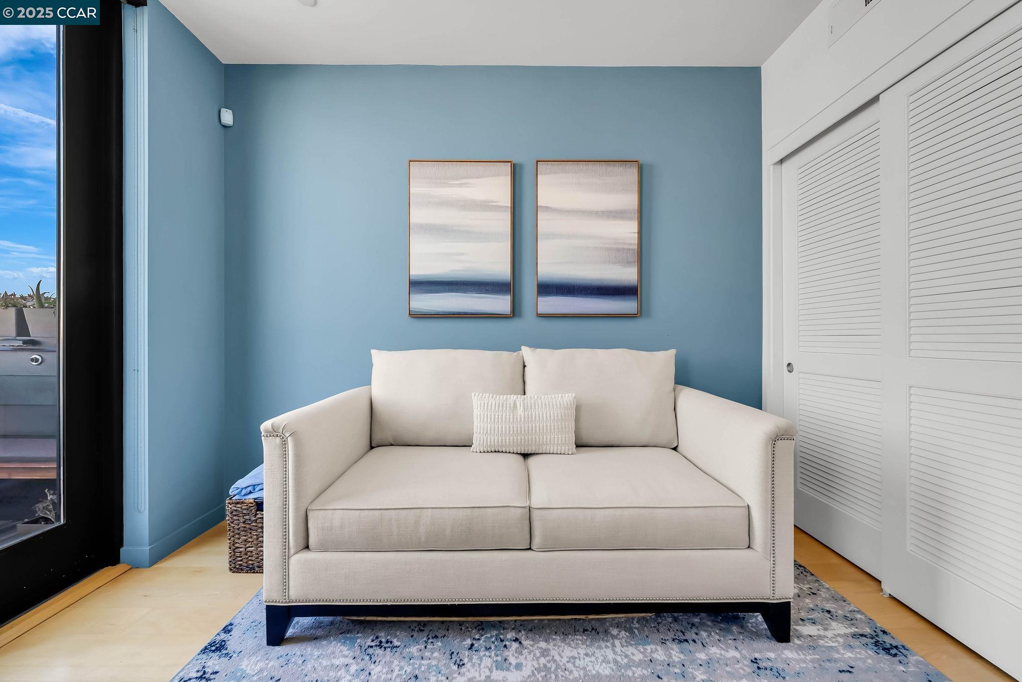 1515 15th Street, Unit 501 San Francisco, CA 94103 - Photo 17 of 46 a living room with furniture and a window