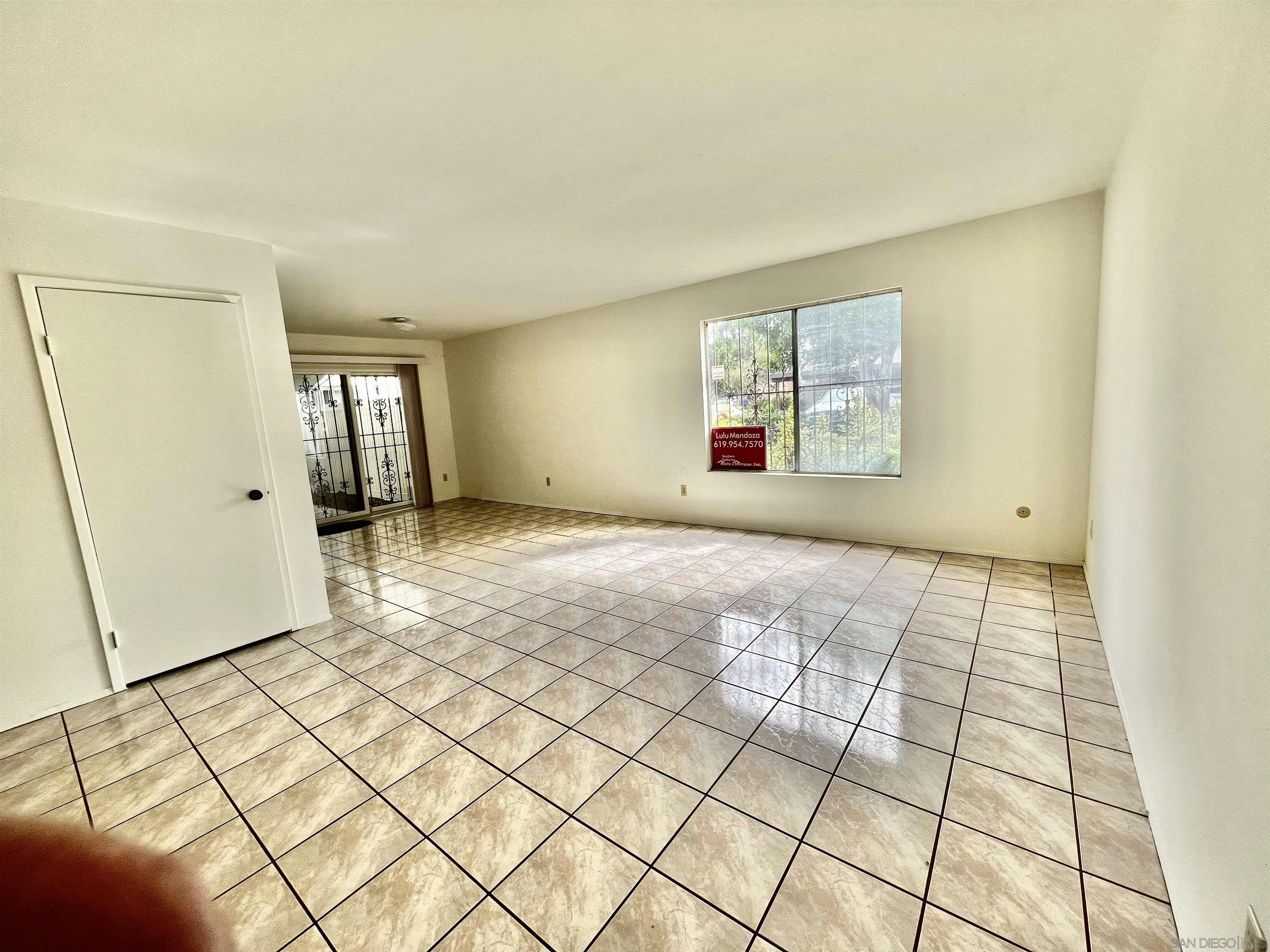 444 Bluffview Road Spring Valley, CA 91977 - Photo 11 of 34 a view of an empty room and window