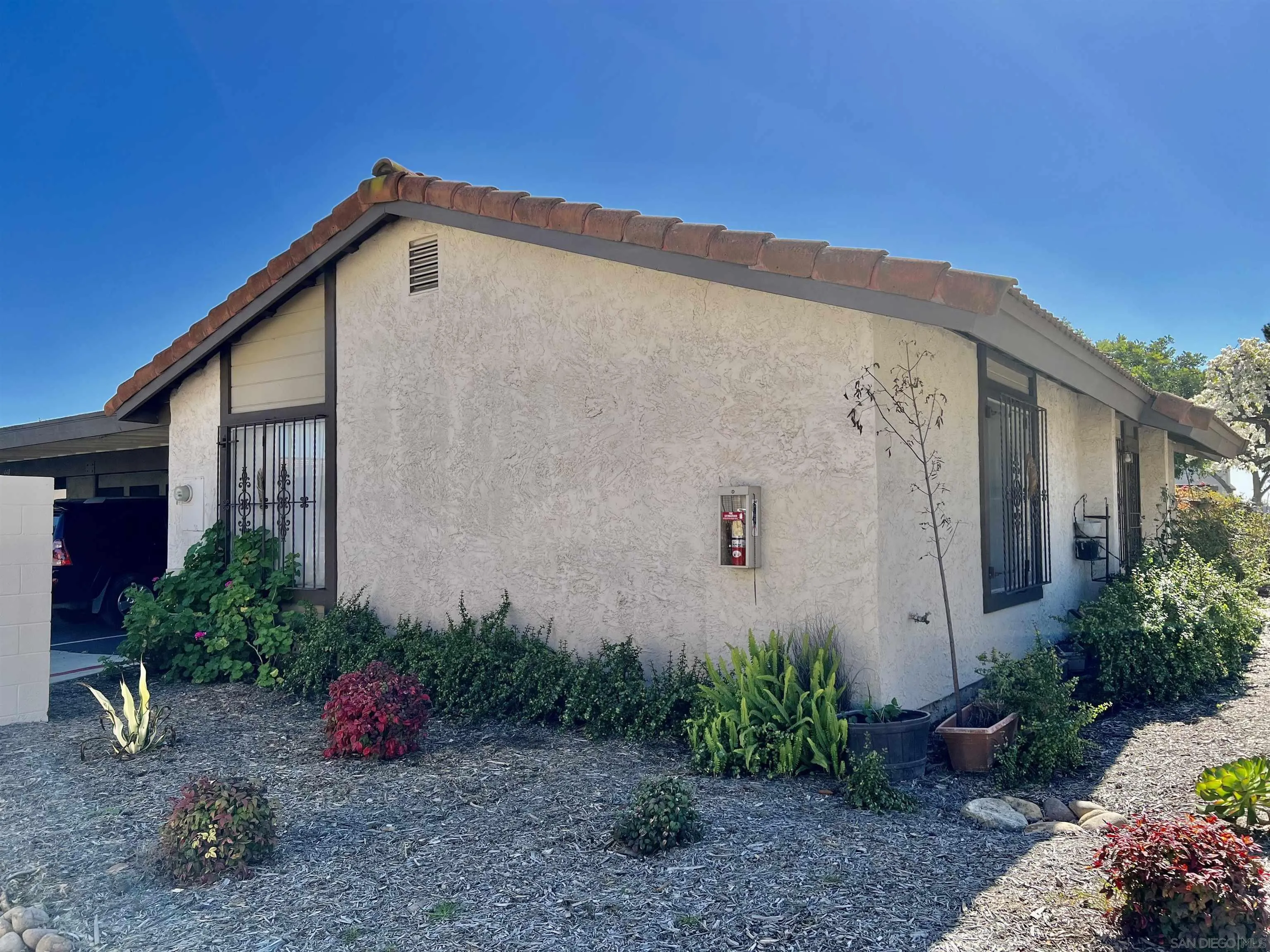 444 Bluffview Road Spring Valley, CA 91977 - Photo 5 of 34 a view of a house with a yard